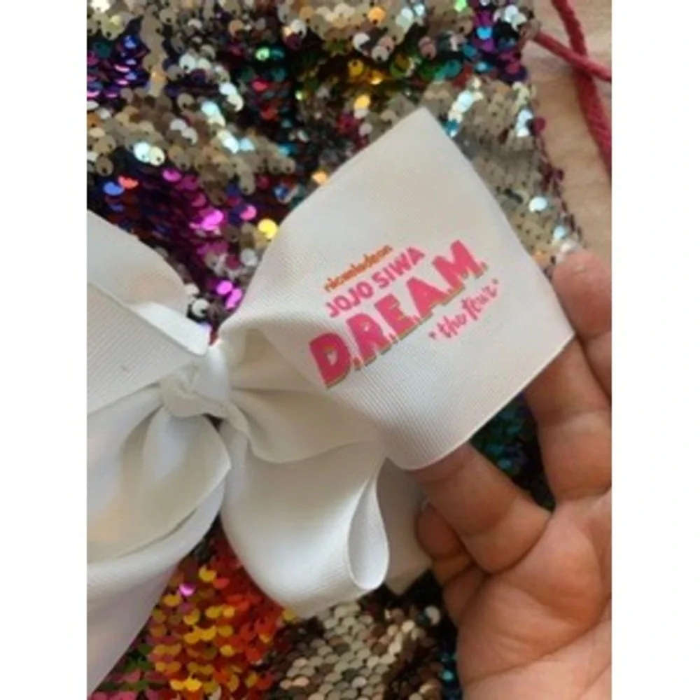 JoJo Siwa DREAM The Tour Rainbow Flip Sequin Drawstring Bag with White Bow Pink